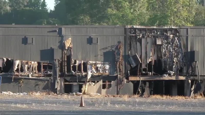 Fire burns part of former Greenetrack building