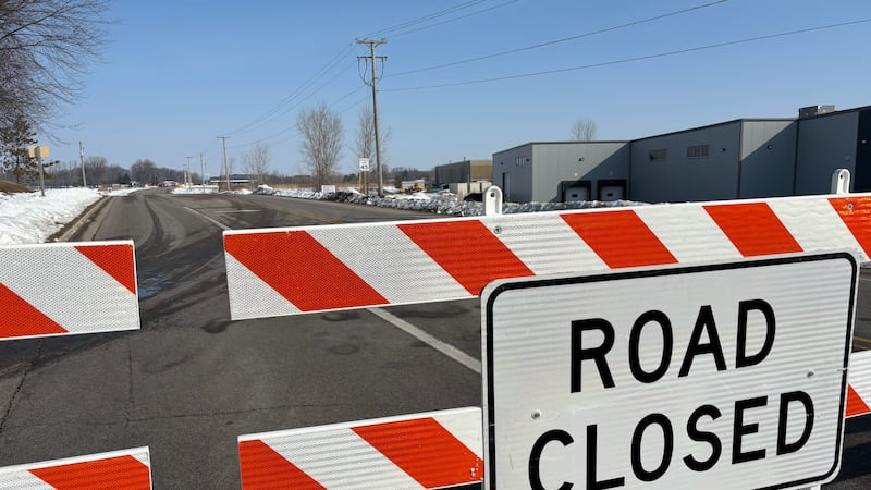 Barricades on County Highway JJ in Kaukauna during a house fire