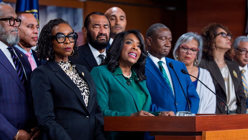 FILE—Rep. Terri Sewell, D-Ala., center, is surrounded by members of the Congressional Black...