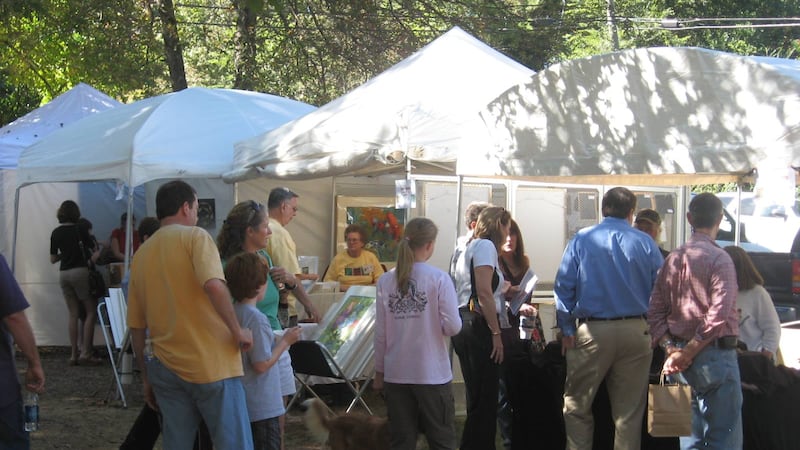 Visitors browse the Bluff Park Art Show.