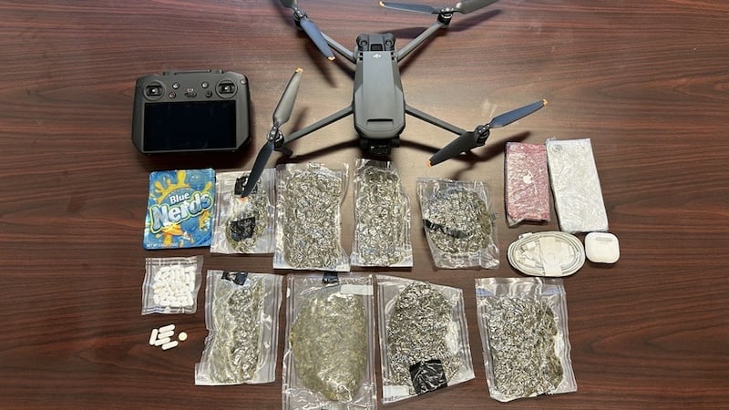 ADOC Narcotics agents and K-9 handlers found a taped package in a car that was stopped near...