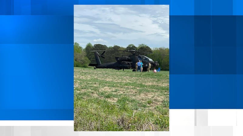 An Army AH-64 Apache helicopter made a precautionary landing in a field in Marshall County...