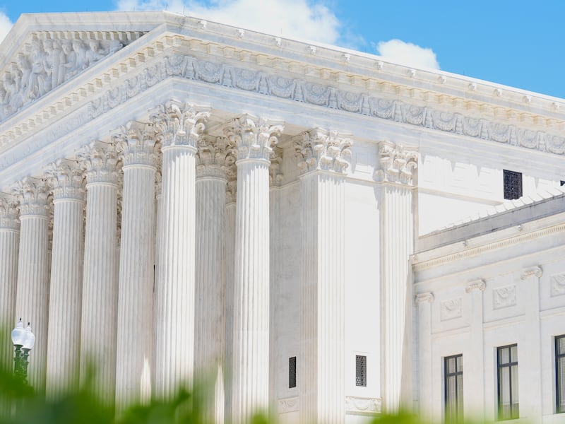 A statue titled the "Authority of Law" sits in front of the Supreme Court on Friday, May 15,...