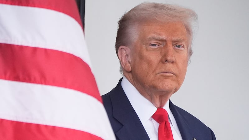 President Donald Trump waits to greet Argentina's President Javier Milei, as he arrives at the...