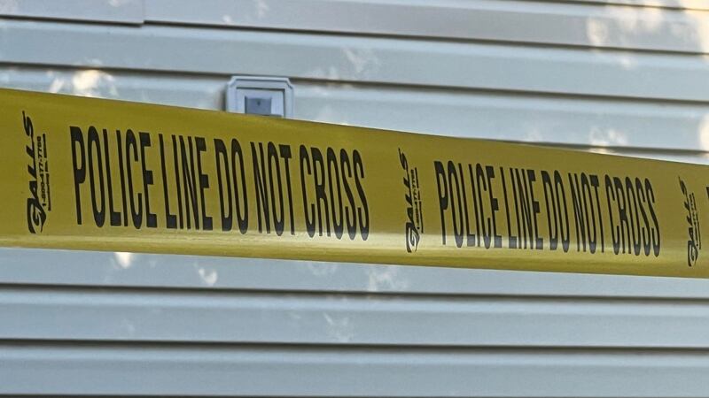 Twin Falls Police officers line crime scene tape in the area of a shooting Wednesday night at...