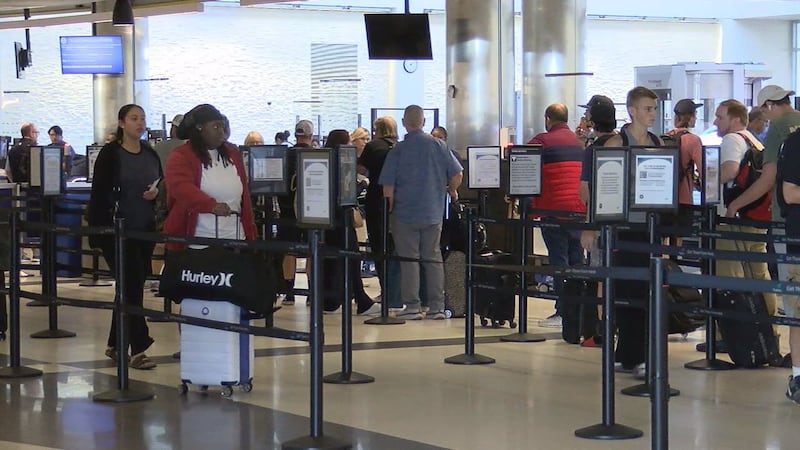 Passengers waiting in line for TSA at the Birmingham-Shuttlesworth International Airport.